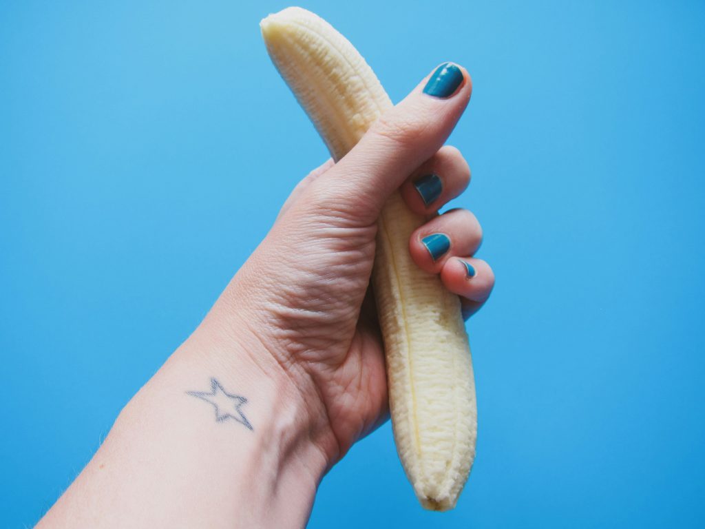 hand holding banana